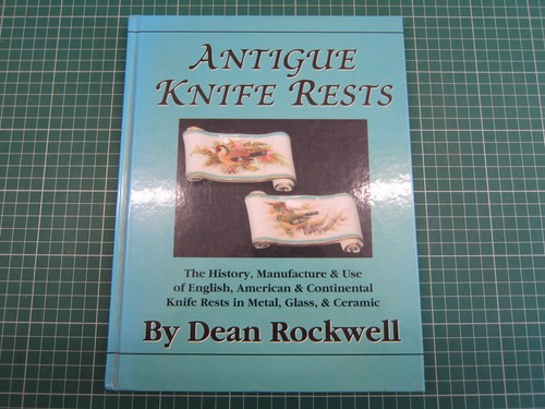 Antique knife rests metal - in,