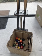 Pool cues and balls