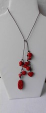 Lariat Red Carved Beads on Brown Leather 28ins by Sandy McCormack