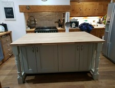 Twin kitchen island units with breakfast bar