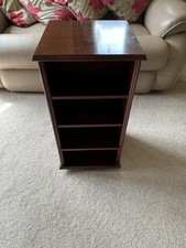 Small Mahogany Double Sided Shelving unit on rotating base