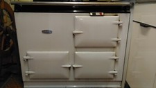 AGA Creamy White.  2 hob with oven.  Oil burner, gravity fed.  