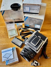 Hasselblad 500C/M + Zeiss Planar CF 80mm f/2.8 T* Lens + A12 + extras + boxes