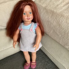 Our Generation Doll With Red