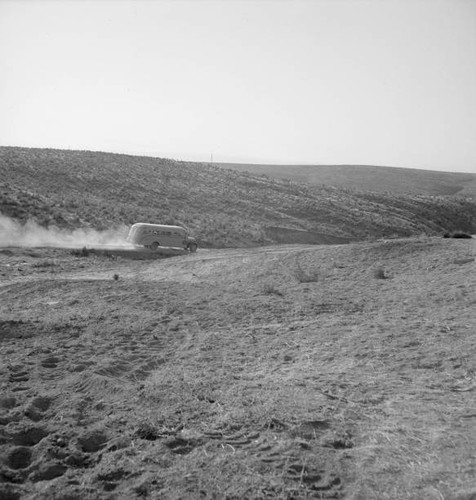 The school bus leaves flat - , at