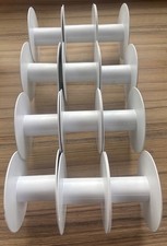 USED EMPTY PLASTIC SPOOLS FOR