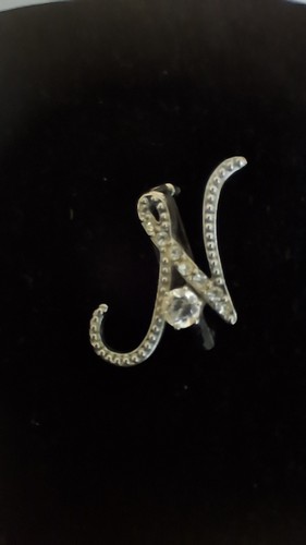 Letter brooch with - letter,