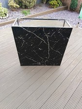 Back and white marble effect coffee table on metal fram