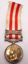 INDIAN MUTINY MINIATURE MEDAL WITH LUCKNOW CLASP