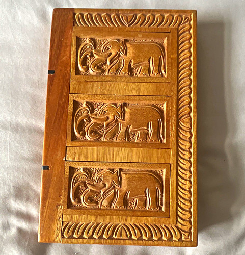 Hand carved wooden elephant - hand,