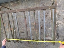 Old vintage Hay Rack equine farming horse hook on planter gardening agricultural