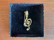 Gold coloured treble clef