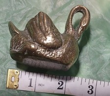 brass swan
