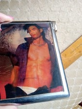 VINTAGE  CIGARETTE CASE WITH CHANGING PICTURES & BUILT IN LIGHTER. CHARITY SALE