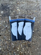 Three Titleist Perma Soft