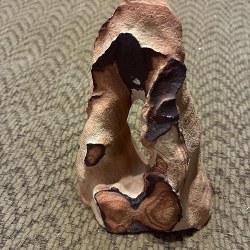 Sand stone arch sculpture with - sand,
