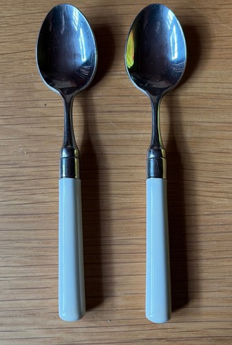 Two vintage teaspoons with - two,