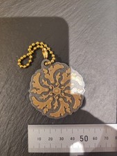 Ltd Ed Oak Island Bagtag Antique Gold on Glitter Pewter Starburst Flower Design