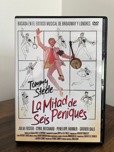 Mitad seis peniques - la, de