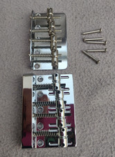 2 x Bass guitar bridges in chrome, 1 is 'heavy duty', other is standard type
