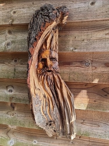 Chainsaw carved green man - chainsaw,