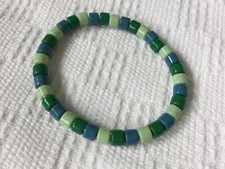 Green aqua shades tube cylinder drum shaped acrylic bead bracelet 7.5in 19 cm