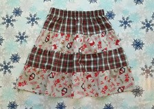 NEW GIRLS CUTE CHRISTMAS FRILLY RUFFLE SKIRT. SANTA TARTAN PENGUINS. AGE 4-7.