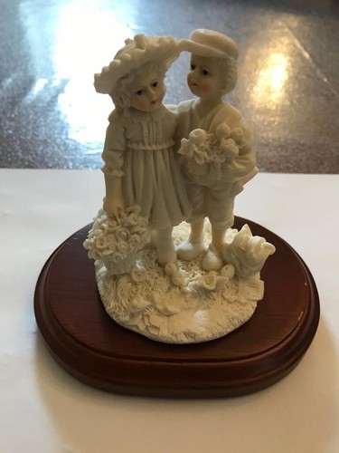 Ivory coloured statue - ivory, of