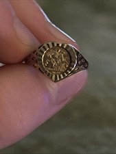 A 9ct gold heart shaped dress