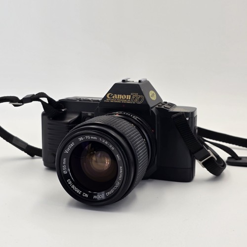 Canon t70 35mm - 35mm, with
