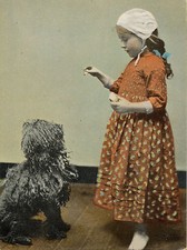 HUNGARIAN PULI AND LITTLE GIRL