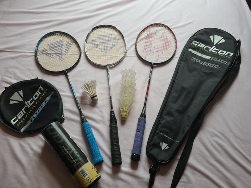 Three badminton rackets - , with