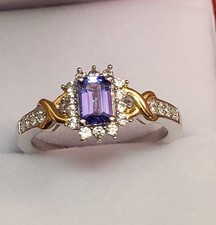 Natural TANZANITE and Zircon Halo Ring In Rhodium Plated Sterling Silver Size O