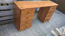 Pine desk 139cm long 8 drawers