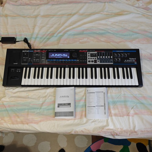 Roland juno synthesizer - g,