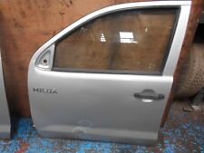 BFD020169 2011 TOYOTA HILUX HL2 2.5 D4D MANUAL FRONT DOOR AND GLASS N/S