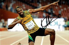 Olympic Athlete Usain Bolt Signed 12x8 Lightning Bolt Pose Photo + Dealer COA