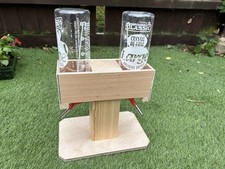 DOUBLE FREE STANDING  GUINEA PIG BOTTLE HOLDER FITS THE CLASSIC 600ML BOTTLE.