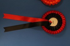 Rosettes RED AND BLACK with  tassels.Add your own centre print in packs of 3