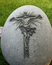 Deep laser engraved crucifix