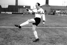 jimmy Melia kicks ball before