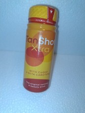 Tan shot xtra tanning and - xtra,