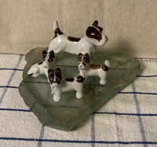 Four Vintage Porcelain Dog