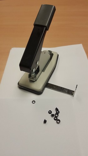 Eyelet machine with 250 black - eyelet,