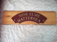 NINE ELMS BATTERSEA RESIN TRAIN SIGN ON SOLID WOOD PLINTH