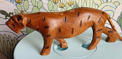 Hand carved wood leopard - hand,