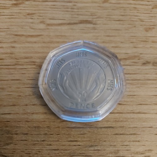 Fifty pence coin - fifty,