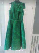 Green sleeveless Mother of the