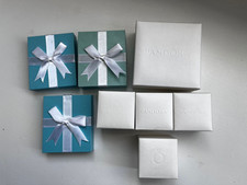 Pandora and QVC empty boxes