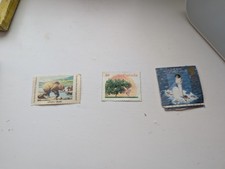 Canadian stamps grizzly bear, lighthouse and peach tree
